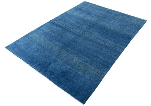 Corner detail of New Persian Gabbeh rug showing border pattern and Wool pile