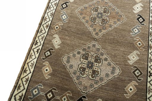Backside of handmade 2000s Persian Gabbeh rug showing knot structure and weave density