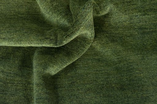 Corner detail of New Persian Gabbeh rug showing border pattern and Wool pile