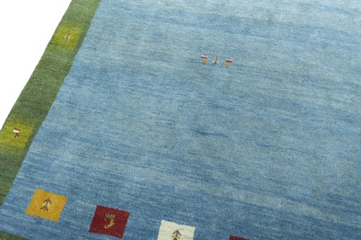 Backside of handmade New Persian Gabbeh rug showing knot structure and weave density