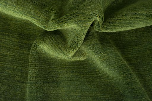Corner detail of New Persian Gabbeh rug showing border pattern and Wool pile
