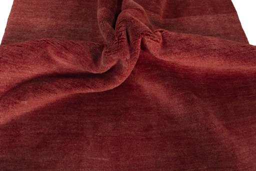 Corner detail of New Persian Gabbeh rug showing border pattern and Wool pile
