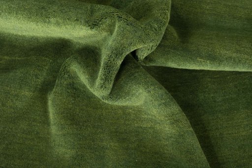 Corner detail of New Persian Gabbeh rug showing border pattern and Wool pile