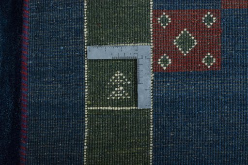 Close-up detail of New Persian Gabbeh rug from Iran / Persia showing Wool weave