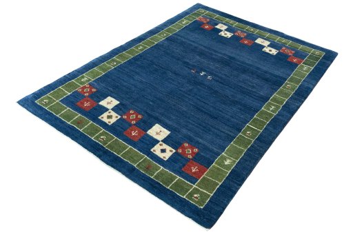 Corner detail of New Persian Gabbeh rug showing border pattern and Wool pile