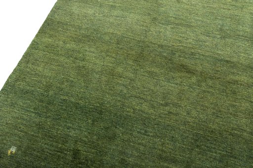 Backside of handmade New Persian Gabbeh rug showing knot structure and weave density