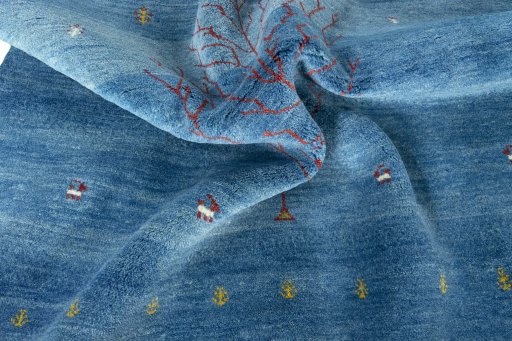 Corner detail of New Persian Gabbeh rug showing border pattern and Wool pile