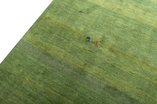 Backside of handmade New Persian Gabbeh rug showing knot structure and weave density