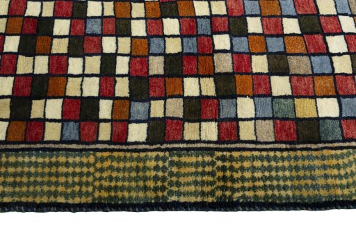 Close-up detail of 2000s Persian Gabbeh rug from Iran / Persia showing Wool weave