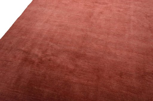 Backside of handmade New Persian Gabbeh rug showing knot structure and weave density