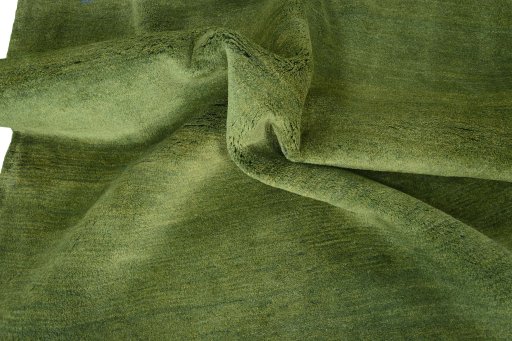 Corner detail of New Persian Gabbeh rug showing border pattern and Wool pile