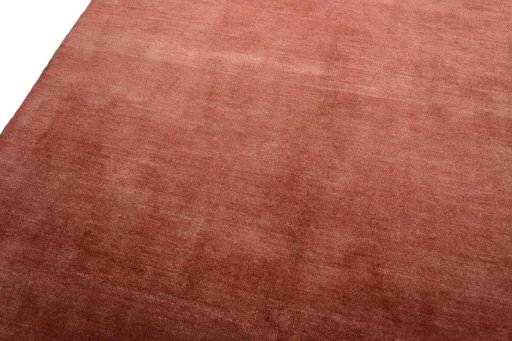 Backside of handmade New Persian Gabbeh rug showing knot structure and weave density