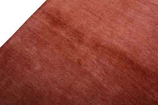 Backside of handmade New Persian Gabbeh rug showing knot structure and weave density