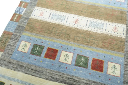 Backside of handmade New Persian Gabbeh rug showing knot structure and weave density