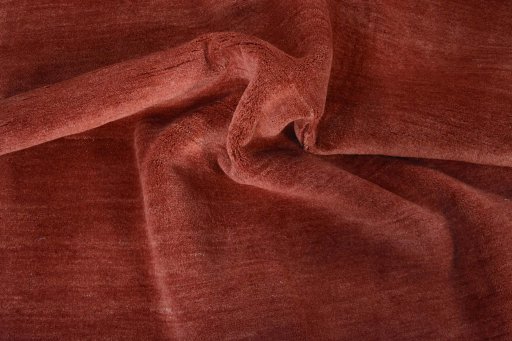 Corner detail of New Persian Gabbeh rug showing border pattern and Wool pile