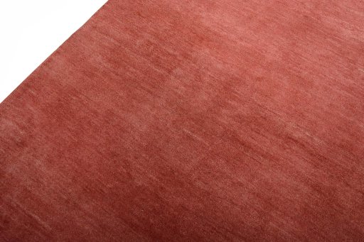 Backside of handmade New Persian Gabbeh rug showing knot structure and weave density