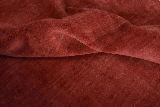 Corner detail of New Persian Gabbeh rug showing border pattern and Wool pile