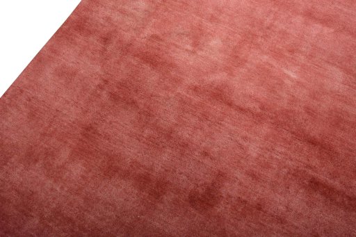 Backside of handmade New Persian Gabbeh rug showing knot structure and weave density