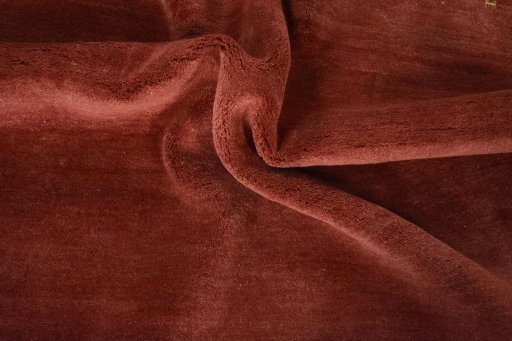 Corner detail of New Persian Gabbeh rug showing border pattern and Wool pile