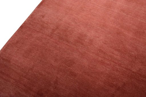 Backside of handmade New Persian Gabbeh rug showing knot structure and weave density