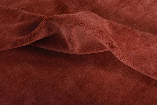 Corner detail of New Persian Gabbeh rug showing border pattern and Wool pile