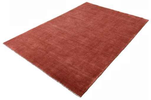 Corner detail of New Persian Gabbeh rug showing border pattern and Wool pile