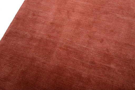 Backside of handmade New Persian Gabbeh rug showing knot structure and weave density