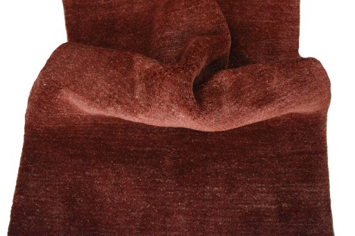 Corner detail of New Persian Gabbeh rug showing border pattern and Wool pile
