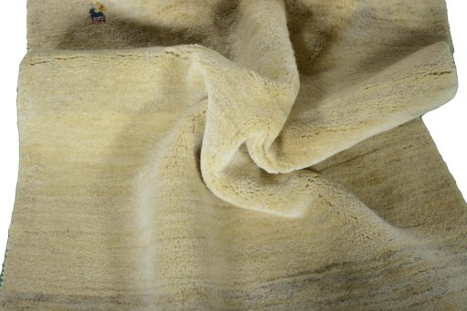 Corner detail of New Persian Gabbeh rug showing border pattern and Wool pile