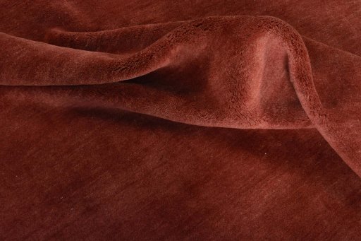 Corner detail of New Persian Gabbeh rug showing border pattern and Wool pile