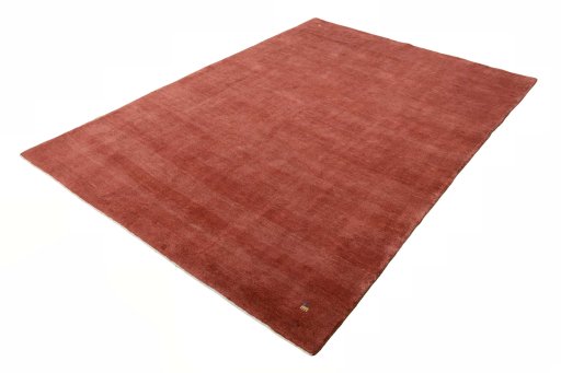 Corner detail of New Persian Gabbeh rug showing border pattern and Wool pile