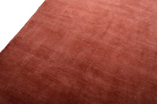 Backside of handmade New Persian Gabbeh rug showing knot structure and weave density