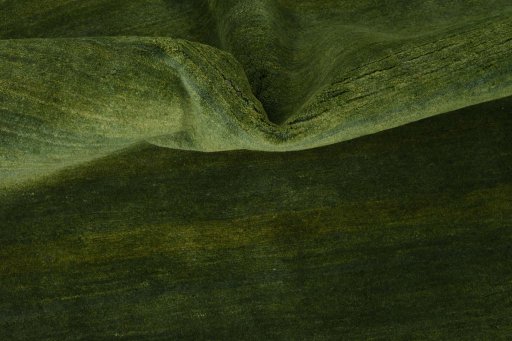 Corner detail of New Persian Gabbeh rug showing border pattern and Wool pile
