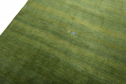 Backside of handmade New Persian Gabbeh rug showing knot structure and weave density