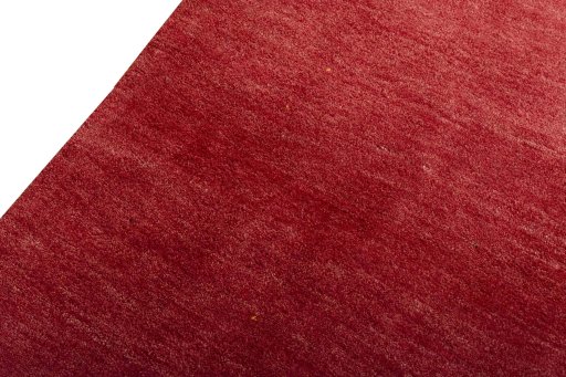Backside of handmade New Persian Gabbeh rug showing knot structure and weave density