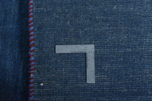 Close-up detail of New Persian Gabbeh rug from Iran / Persia showing Wool weave