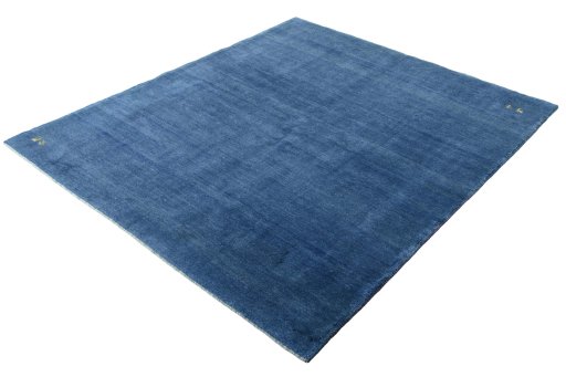 Corner detail of New Persian Gabbeh rug showing border pattern and Wool pile