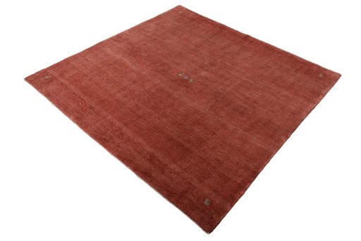 Corner detail of New Persian Gabbeh rug showing border pattern and Wool pile