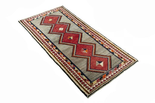 Close-up detail of 2000s Persian Gabbeh rug from Iran / Persia showing Wool weave