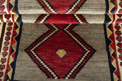 Full view of 2000s Persian Gabbeh rug from Iran / Persia, 195 × 94 cm in Gray tones