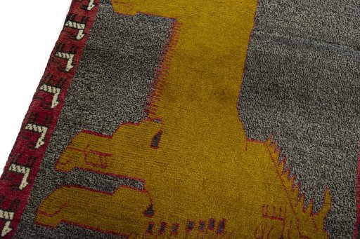 Backside of handmade 2000s Persian Gabbeh rug showing knot structure and weave density