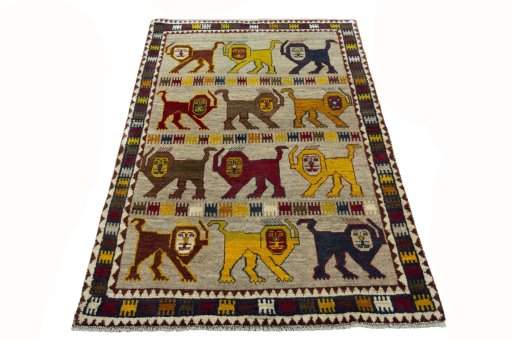 Surface texture of 2000s Persian Gabbeh rug with natural Wool and intricate pattern