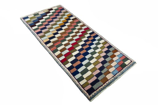 Close-up detail of 2000s Persian Gabbeh rug from Iran / Persia showing Wool weave
