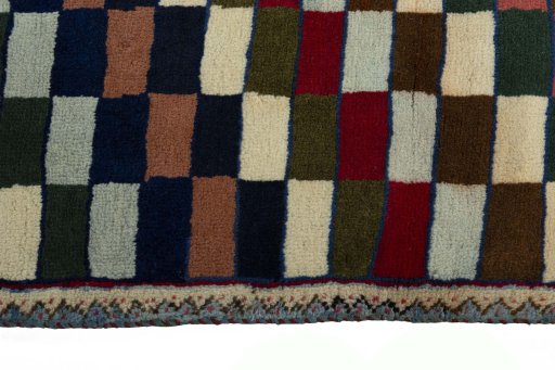 Close-up detail of 2000s Persian Gabbeh rug from Iran / Persia showing Wool weave