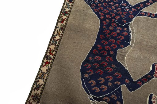 Backside of handmade 2000s Persian Gabbeh rug showing knot structure and weave density