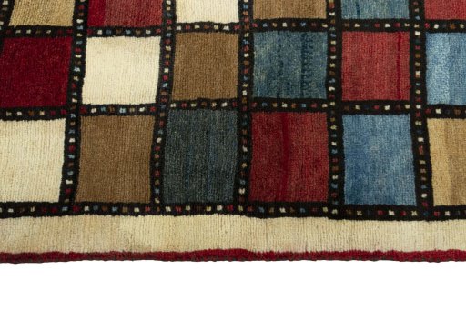 Close-up detail of 2000s Persian Gabbeh rug from Iran / Persia showing Wool weave