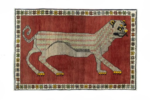 Full view of 2000s Persian Gabbeh rug from Iran / Persia, 157 × 105 cm in Red tones