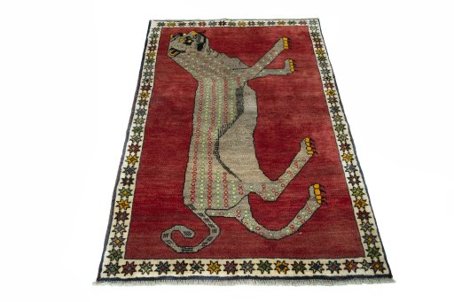 Surface texture of 2000s Persian Gabbeh rug with natural Wool and intricate pattern