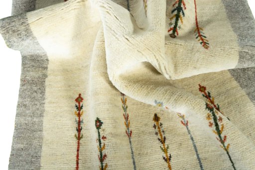 Corner detail of New Persian Gabbeh rug showing border pattern and Wool pile