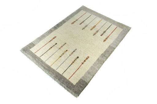 Corner detail of New Persian Gabbeh rug showing border pattern and Wool pile